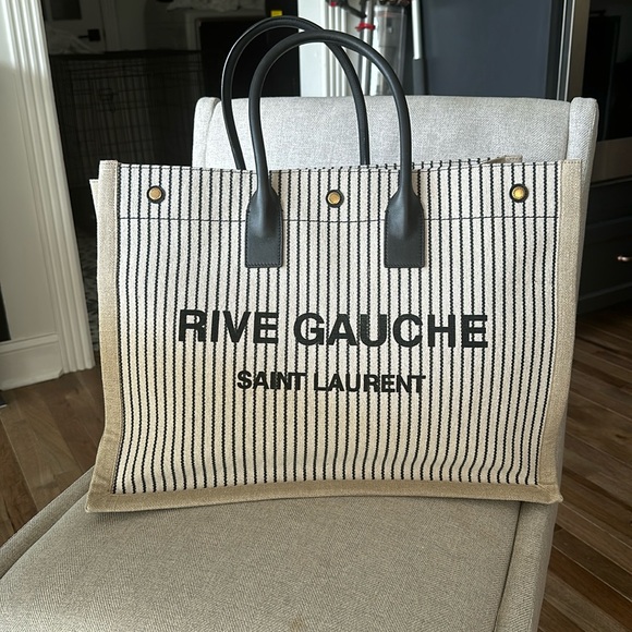 Yves Saint Laurent Handbags - Like new worn a few times. No box or dust bag. Normal wear and tear on the sides